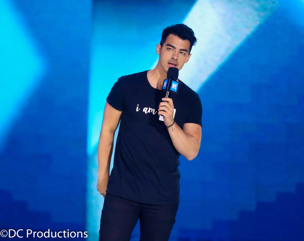 "INGLEWOOD, CA - APRIL 07: Singer Joe Jonas speaks onstage at WE Day California 2016 at The Forum on April 7, 2016 in Inglewood, California. (Photo by Frederick M. Brown/Getty Images for WE Day )"