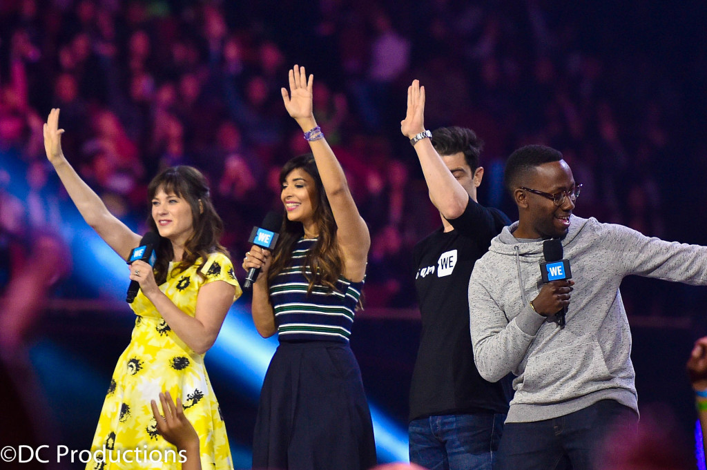 "INGLEWOOD, CA - APRIL 07: (L-R) Actors Zooey Deschanel, Hannah Simone, Max Greenfield, and Lamorne Morris speak onstage at WE Day California 2016 at The Forum on April 7, 2016 in Inglewood, California. 