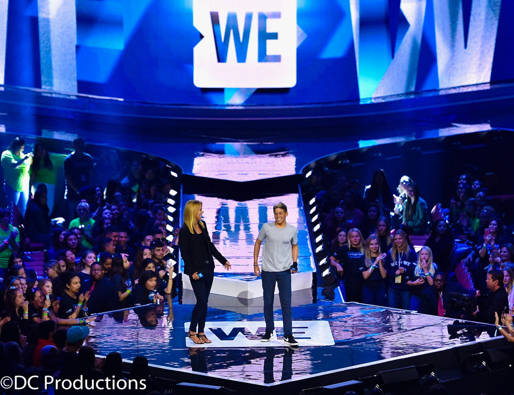 "INGLEWOOD, CA - APRIL 07: WE Day California Co-Chair Stephanie Argyros (L) and Gunnar Argyros speak onstage at WE Day California 2016 at The Forum on April 7, 2016 in Inglewood, California. (Photo by Mike Windle/Getty Images for WE Day)"