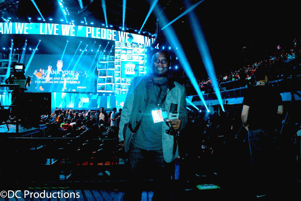 "INGLEWOOD, CA - APRIL 07: Channel A TV Founder Davies Chirwa while filming a segment at WE Day California 2016 at The Forum on April 7, 2016 in Inglewood, California. 